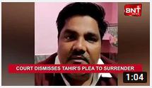 Tahir hussain arrested